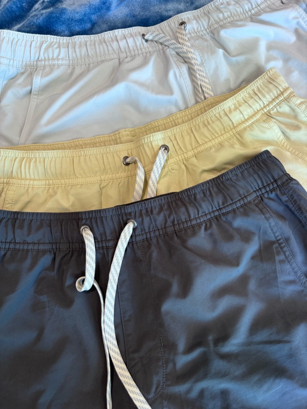 Bundle of Vuori Men's Shorts Trio — Light Gray, Pale Yellow, Dark Gray